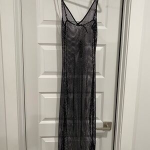 Anthropologie intimate’s. Black beaded see through slip with tassels at calf.